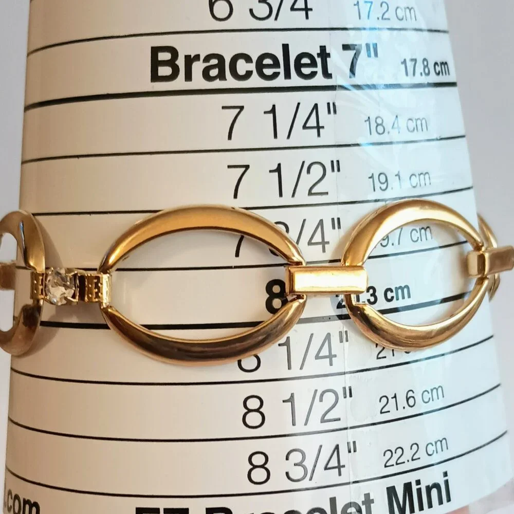 Avon gold tone